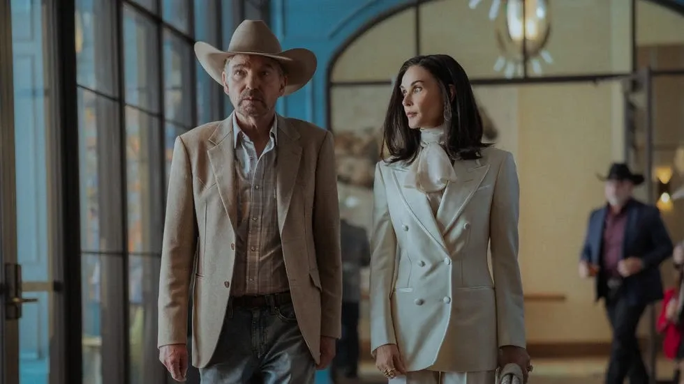 Thornton's Tommy Norris in corporate headquarters wearing a cowboy hat with blazer—visual shorthand for the show's central tension between frontier identity and modern corporate power structures. This duality defines much of Landman's cult