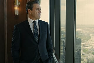 Monty Miller looking out over the city in Landman