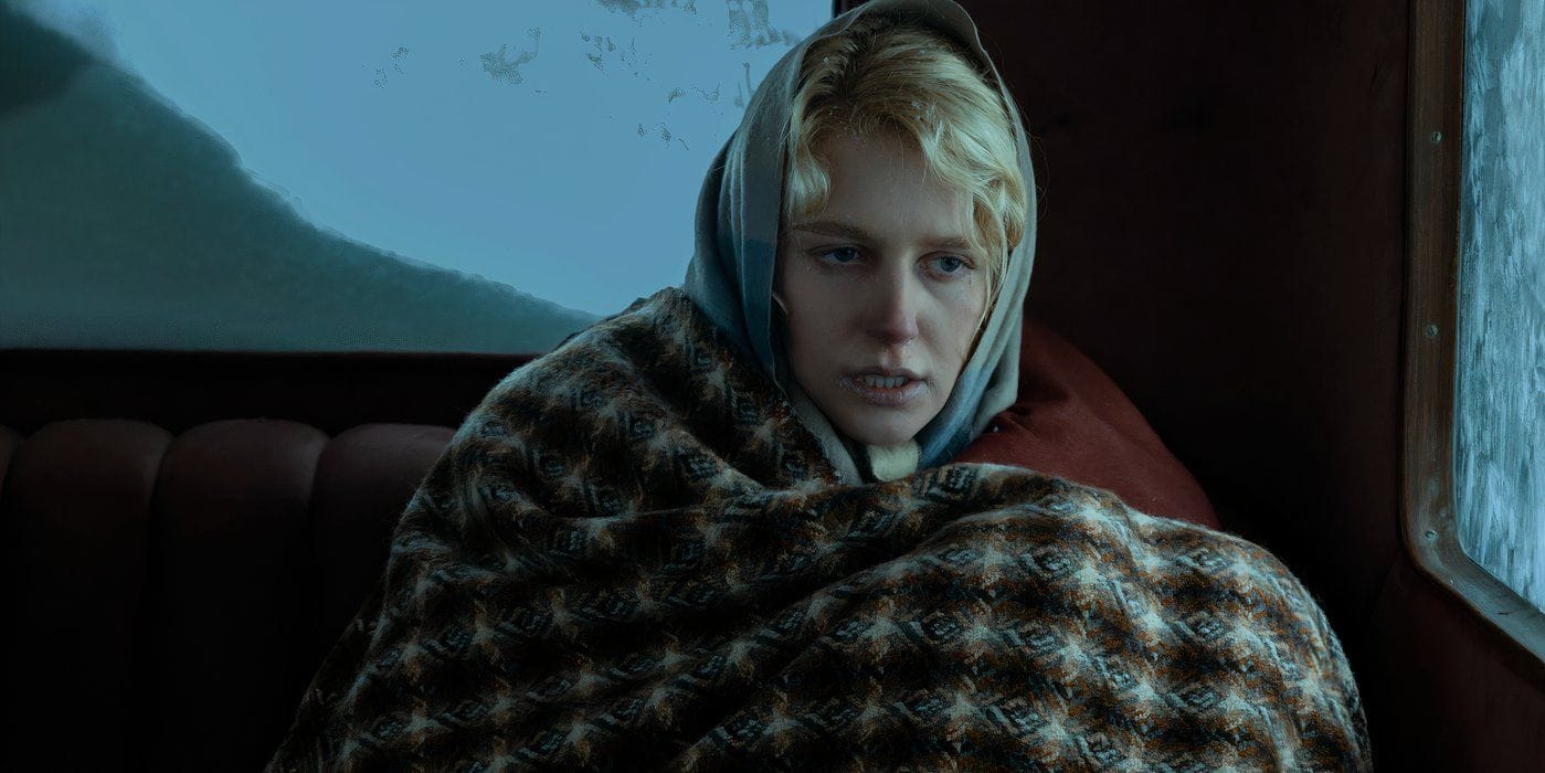Julia Schlaepfer as Alexandra Dutton wrapped in blankets after being found by Spencer on the Montana train in the 1923 Season 2 finale — frostbite already irreversible. (Image: Paramount+/Screen Rant)